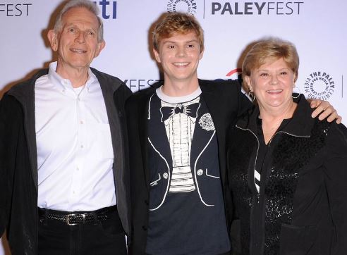 Julie Peters with her husband and son Evan Peters